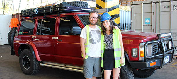 Kev and Emma stand beside the 4x4 after collecting it in Buenos Aires.