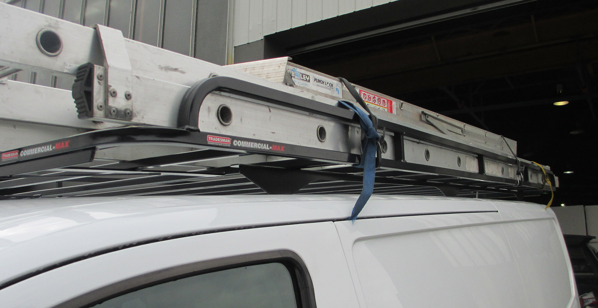 Commercial-Max-roof-rack-showing-mounting-brackets-on-a-Ford-Transit-van