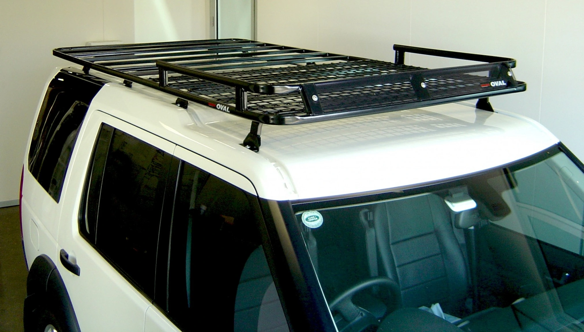 Oval-Alloy-tent-style-roof-racks-provide-space-for-a-roof-top-tent-and-storage