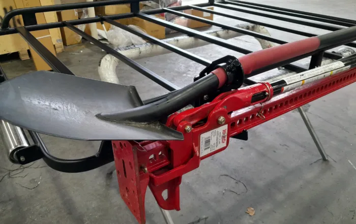 Roof rack shovel holder accessory